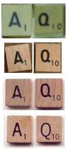 Four early Scrabble tile types.