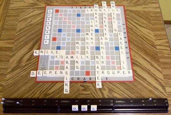 First Deluxe Scrabble: 1st game, plus scoring racks.