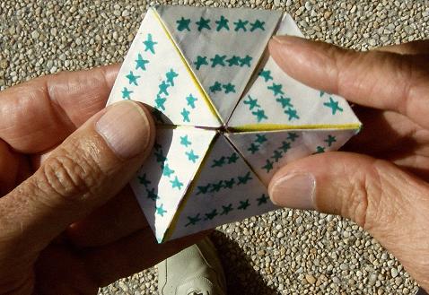 Flexing a hexaflexagon, step 2.